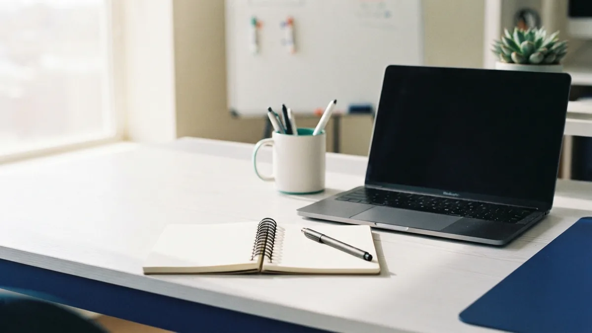 Clean computer workspace representing faster sign-in and fewer background apps